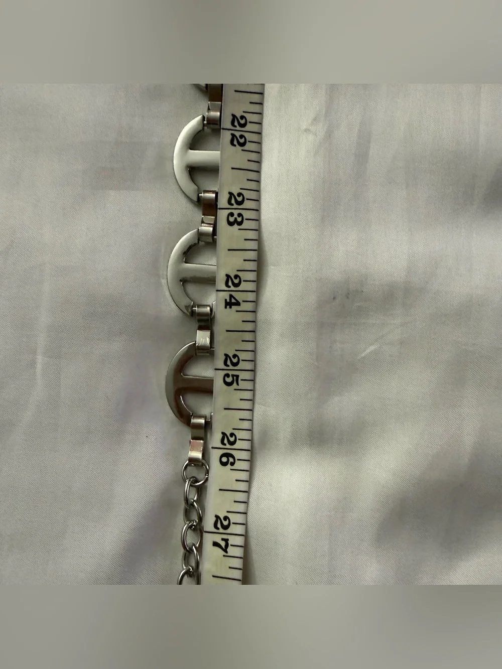 Silver tone metal chain belt with rhinestone details